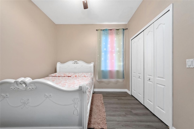 bedroom featuring a closet, wood-type flooring, and ceiling fan