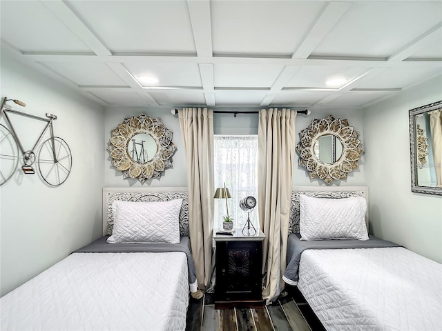 bedroom featuring coffered ceiling and dark hardwood / wood-style floors