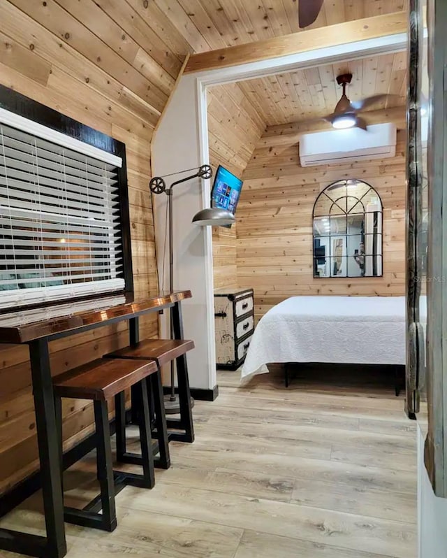 bedroom featuring light hardwood / wood-style flooring, vaulted ceiling, wooden walls, wooden ceiling, and a wall mounted AC