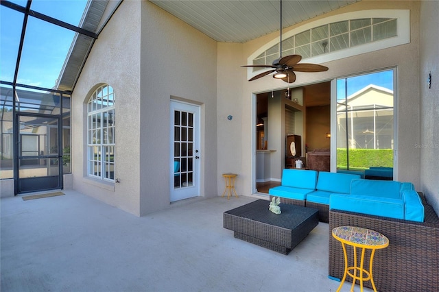 exterior space with ceiling fan, plenty of natural light, and high vaulted ceiling