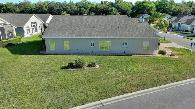 exterior space featuring a front lawn