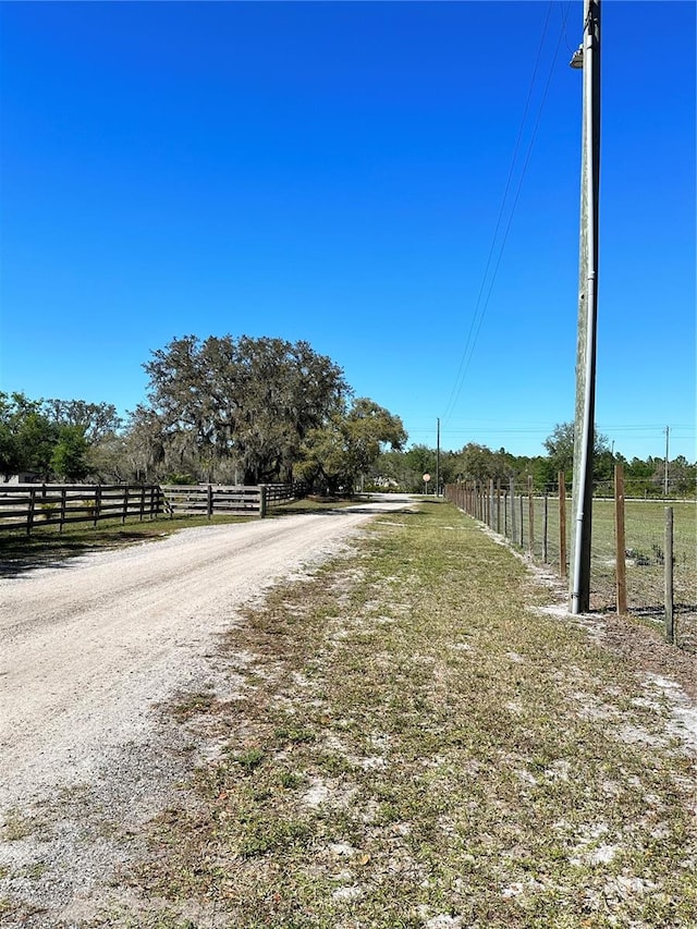 view of road with a rural view