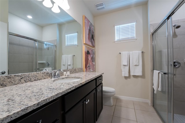 bathroom with walk in shower, tile flooring, toilet, and vanity