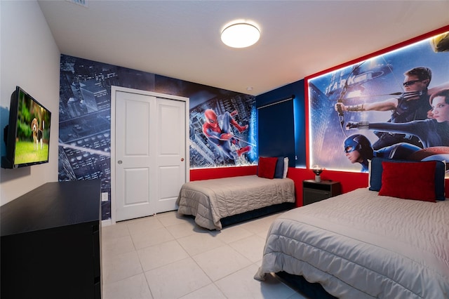 bedroom featuring light tile flooring