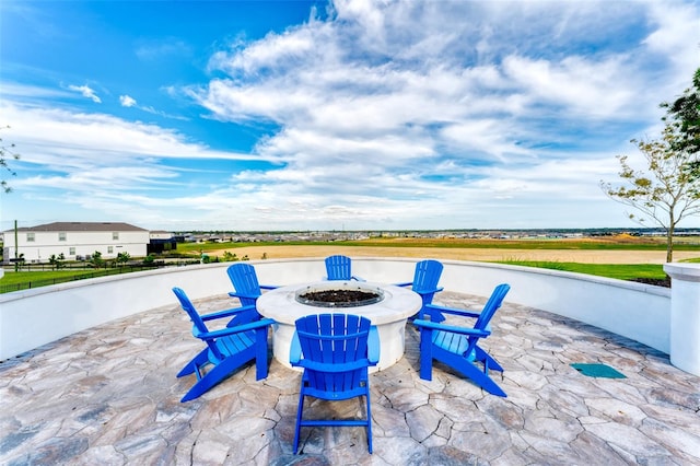 view of patio / terrace featuring a fire pit