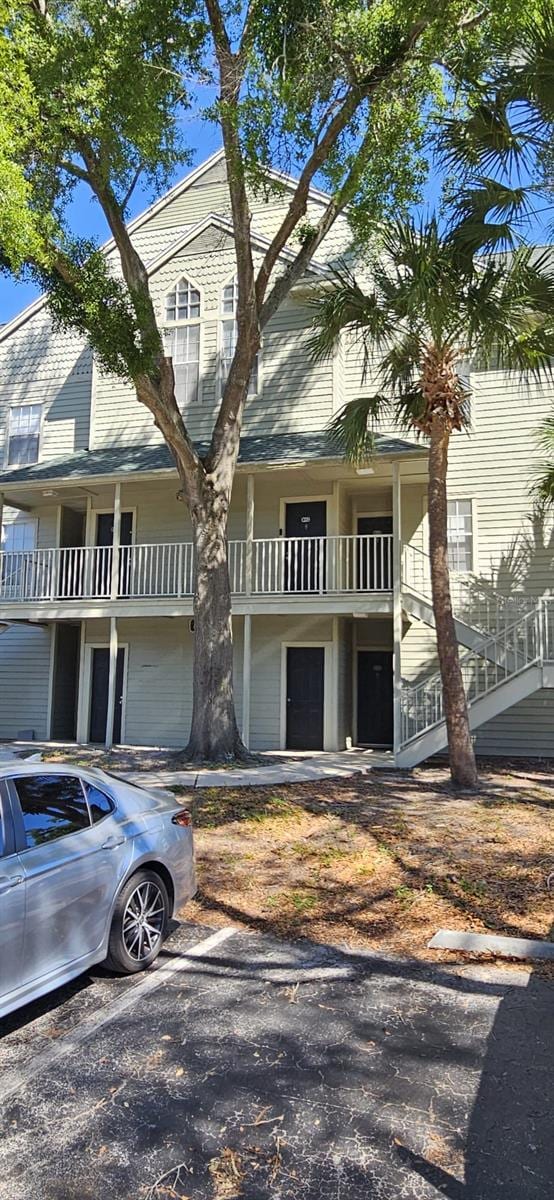 view of front of home with a balcony