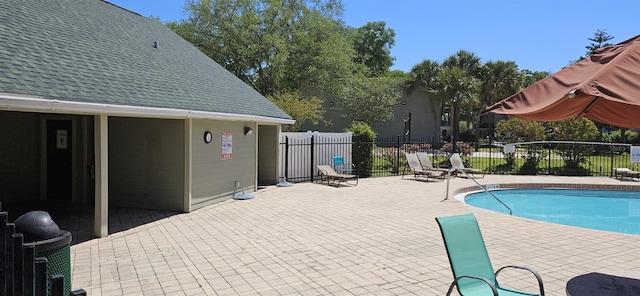 view of pool featuring a patio