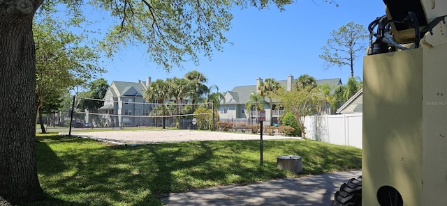 view of yard featuring volleyball court