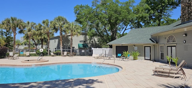 view of pool featuring a patio area