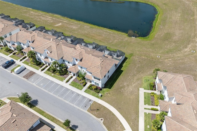 drone / aerial view with a water view