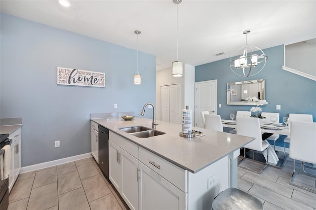 kitchen featuring sink, dishwashing machine, a chandelier, white cabinetry, and hanging light fixtures