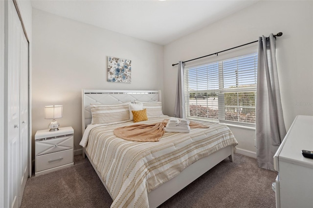 carpeted bedroom with a closet