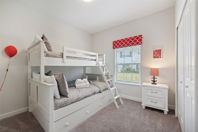 carpeted bedroom featuring a closet