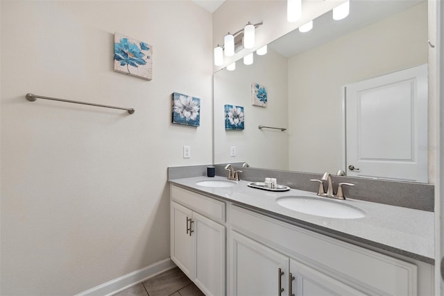 bathroom with tile flooring and dual bowl vanity