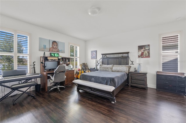 bedroom featuring dark hardwood / wood-style floors