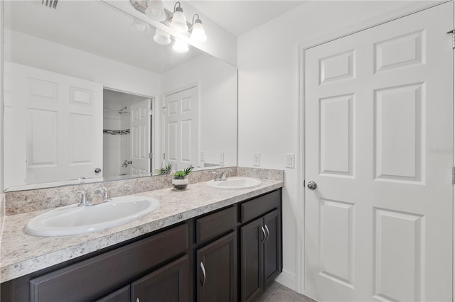 bathroom featuring double sink vanity