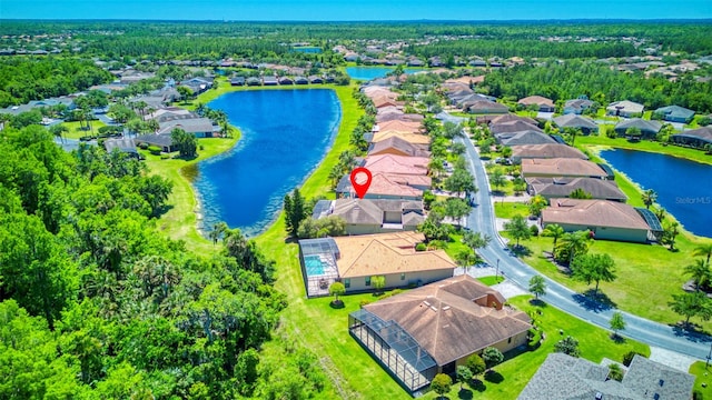 drone / aerial view with a water view