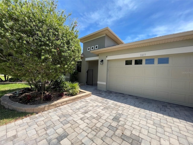 view of front of house with a garage