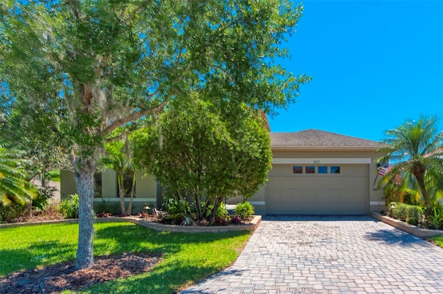 view of front of property with a garage