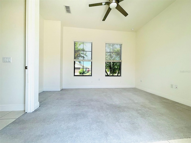 carpeted empty room with ceiling fan