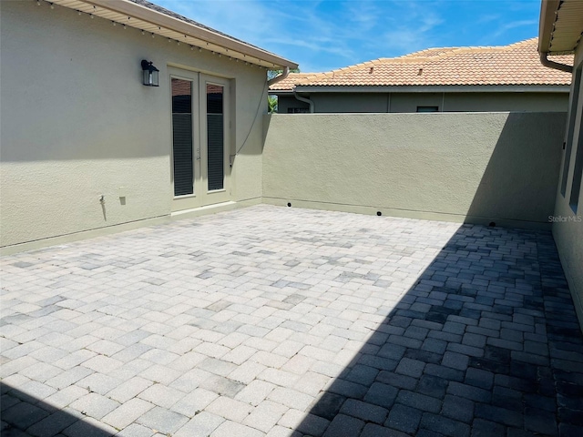 view of patio featuring french doors