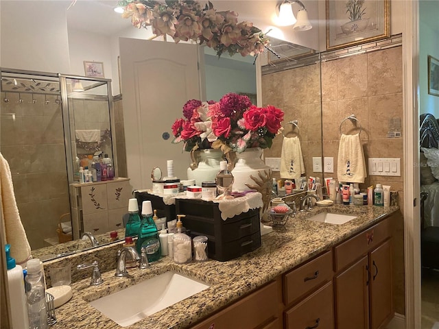 2410 Datura Loop, Saint Cloud, FL 34772 - full bathroom featuring a shower stall and double vanity