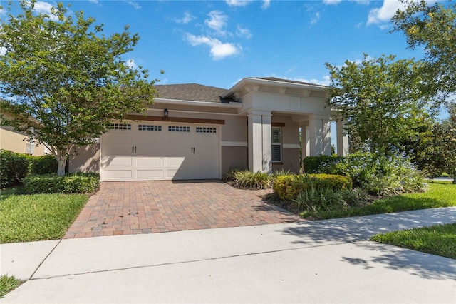 view of front of property featuring a garage