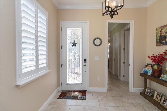 foyer entrance with plenty of natural light, crown molding, and light tile floors