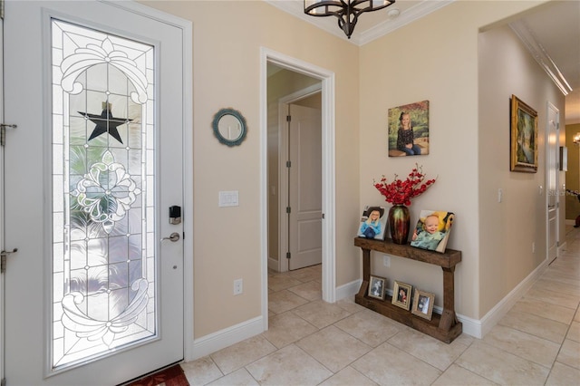 entryway featuring ornamental molding and light tile floors