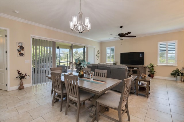 tiled dining area featuring ceiling fan with notable chandelier and crown molding