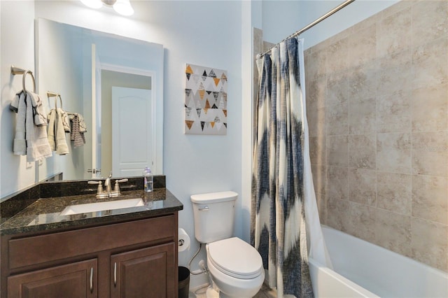 full bathroom with vanity with extensive cabinet space, shower / bath combination with curtain, and toilet