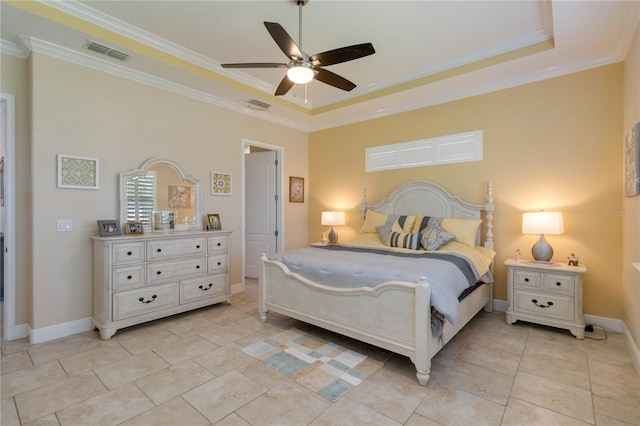 tiled bedroom featuring crown molding, ceiling fan, and a raised ceiling