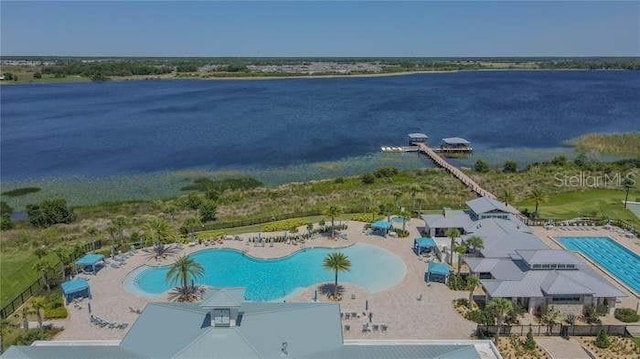 drone / aerial view with a water view