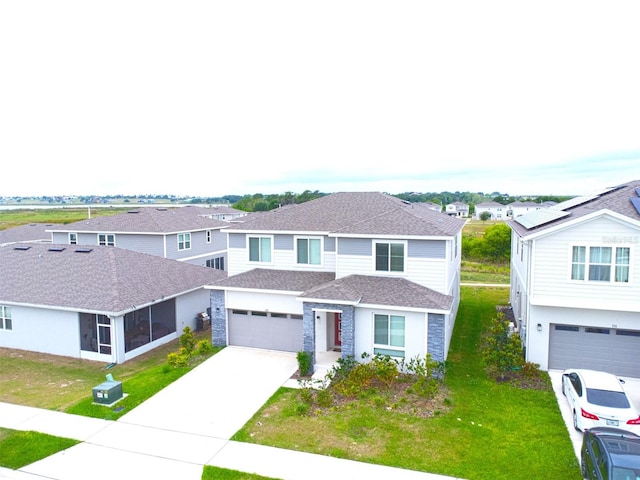 view of front of home with a garage