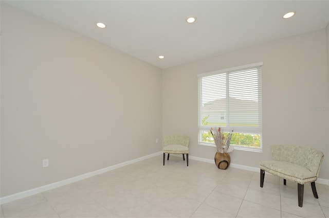 sitting room featuring light tile patterned floors