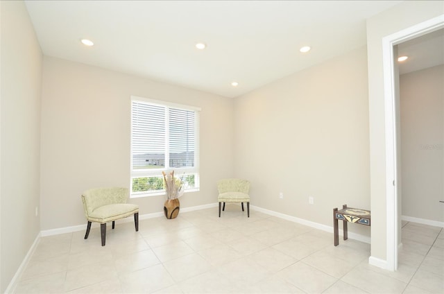 living area with light tile patterned floors