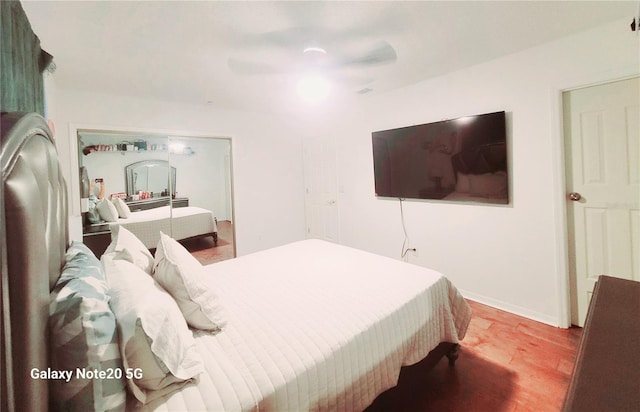 bedroom featuring ceiling fan and light wood-type flooring