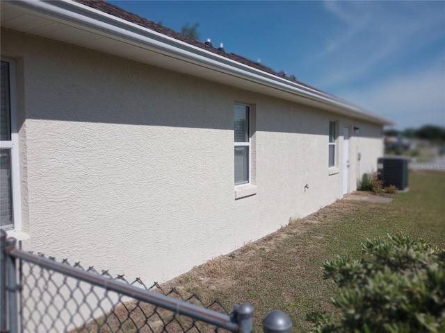 view of property exterior featuring central AC unit