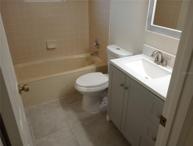 full bathroom with toilet, tile flooring, vanity, and bathing tub / shower combination