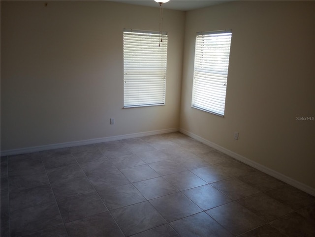 view of tiled spare room