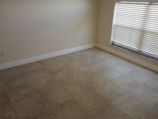 view of tiled spare room