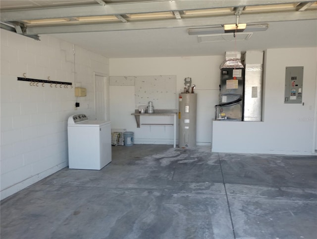 garage featuring washer / clothes dryer and electric water heater