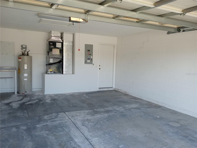 garage featuring heating utilities and electric water heater