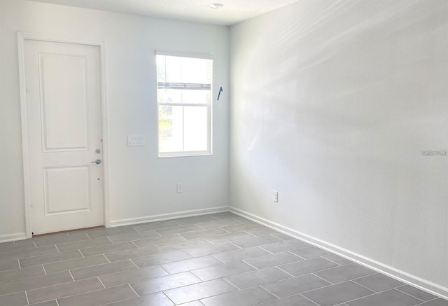 view of tiled spare room