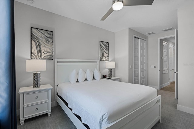 bedroom featuring a closet, ceiling fan, and dark colored carpet