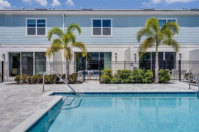 view of pool featuring a patio