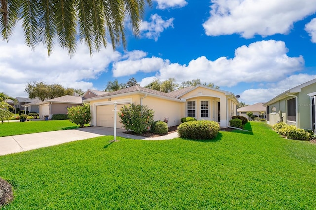 view of front facade with a garage and a front yard