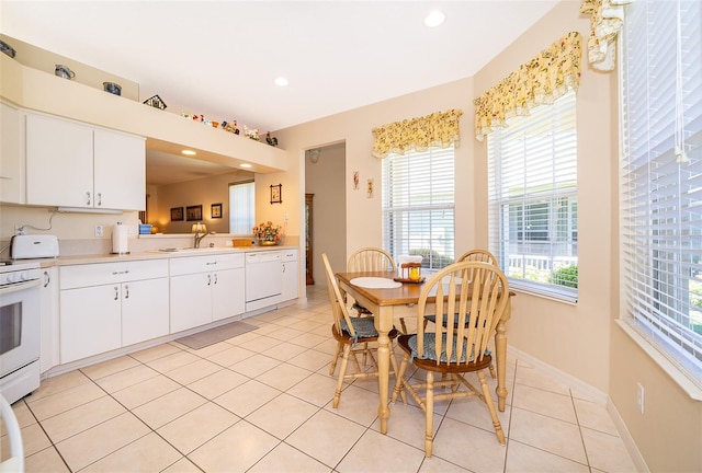 tiled dining area with sink