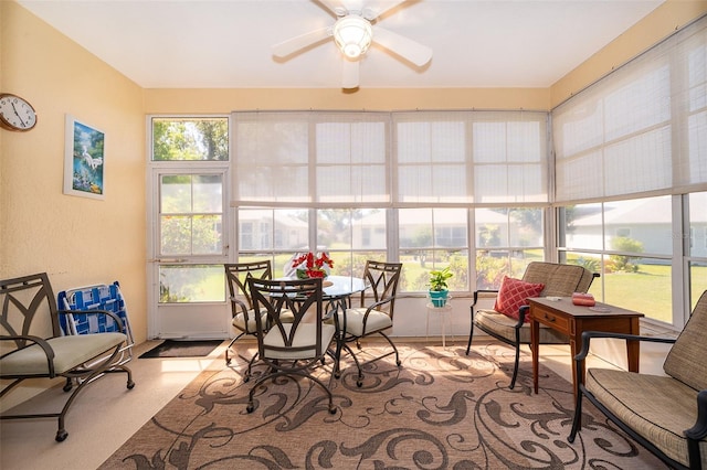 sunroom / solarium with ceiling fan