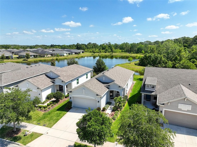 bird's eye view with a water view